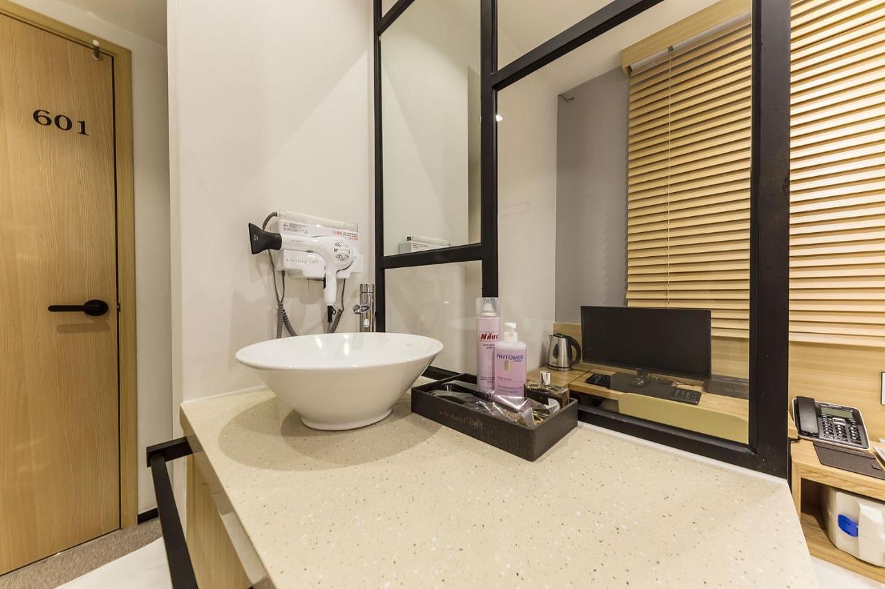 Raha Hotel Сеул Экстерьер фото